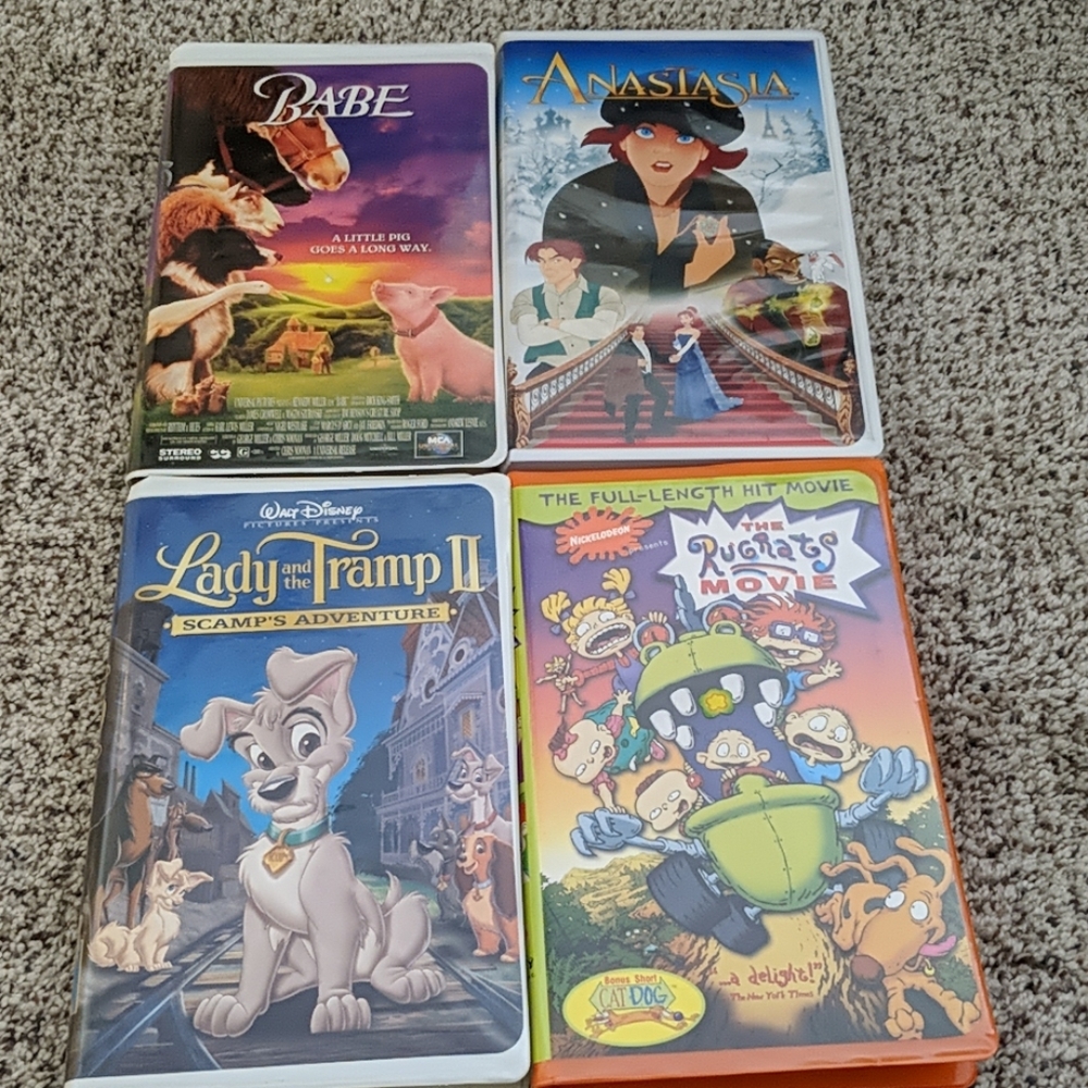 Four kids VHS movies lady & tramp babe more